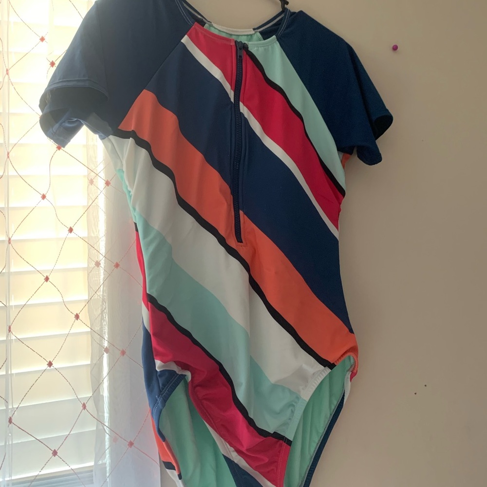 Short sleeve one piece swim suit.